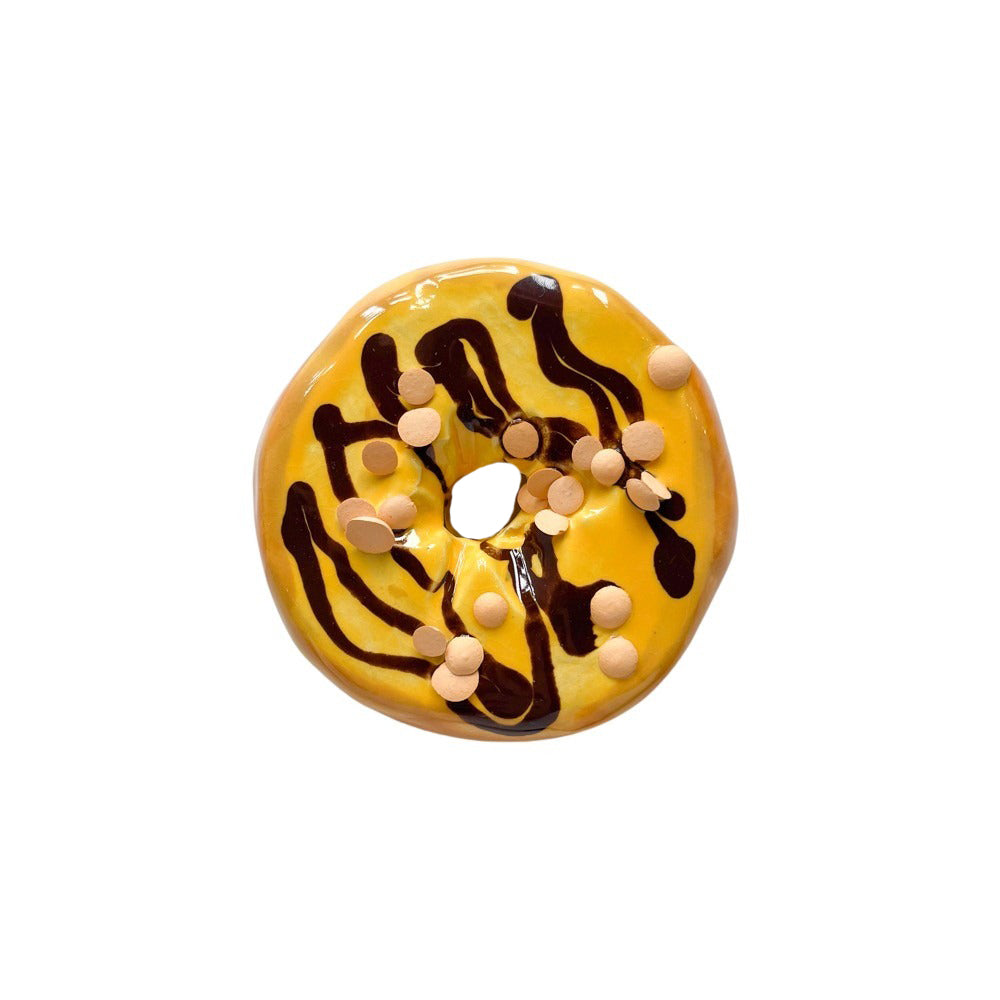Orange Donut With Chocolate Drizzle & Chips
