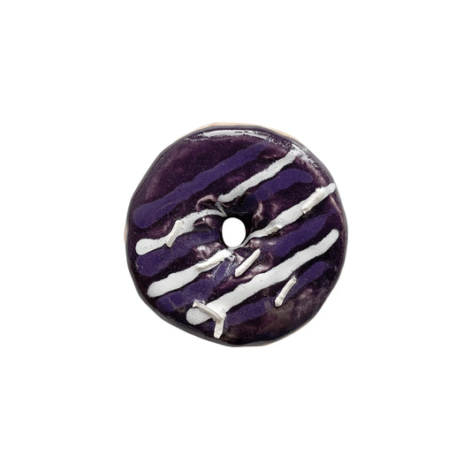 Boysenberry Donut With Stripes And Sprinkles